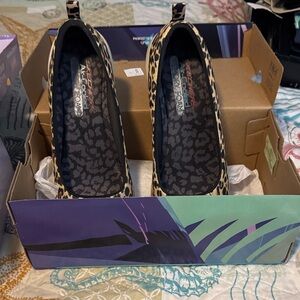 Skechers Leopard Print Slip-On Ballet Flats in Tan and Black